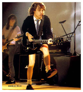 ACDC-angus-malcolm-young-duck-walk-jaming-guitar.jpg